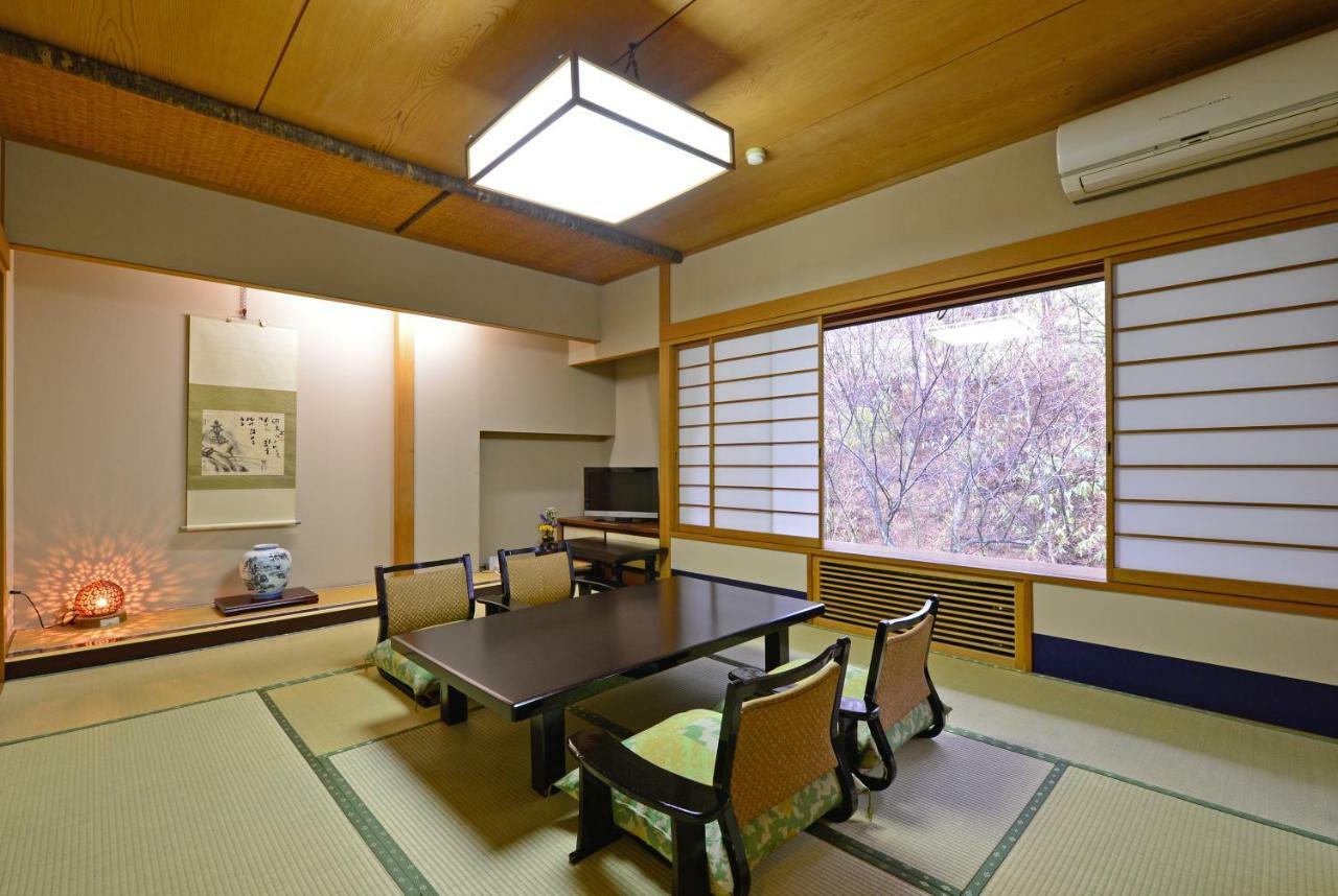 Osakaya Ryokan Кусацу Экстерьер фото